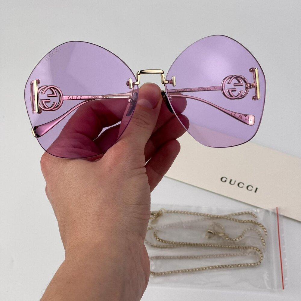 Gucci GG1203S 001 Women’s Rimless Round Sunglasses Gold with Detachable Chain